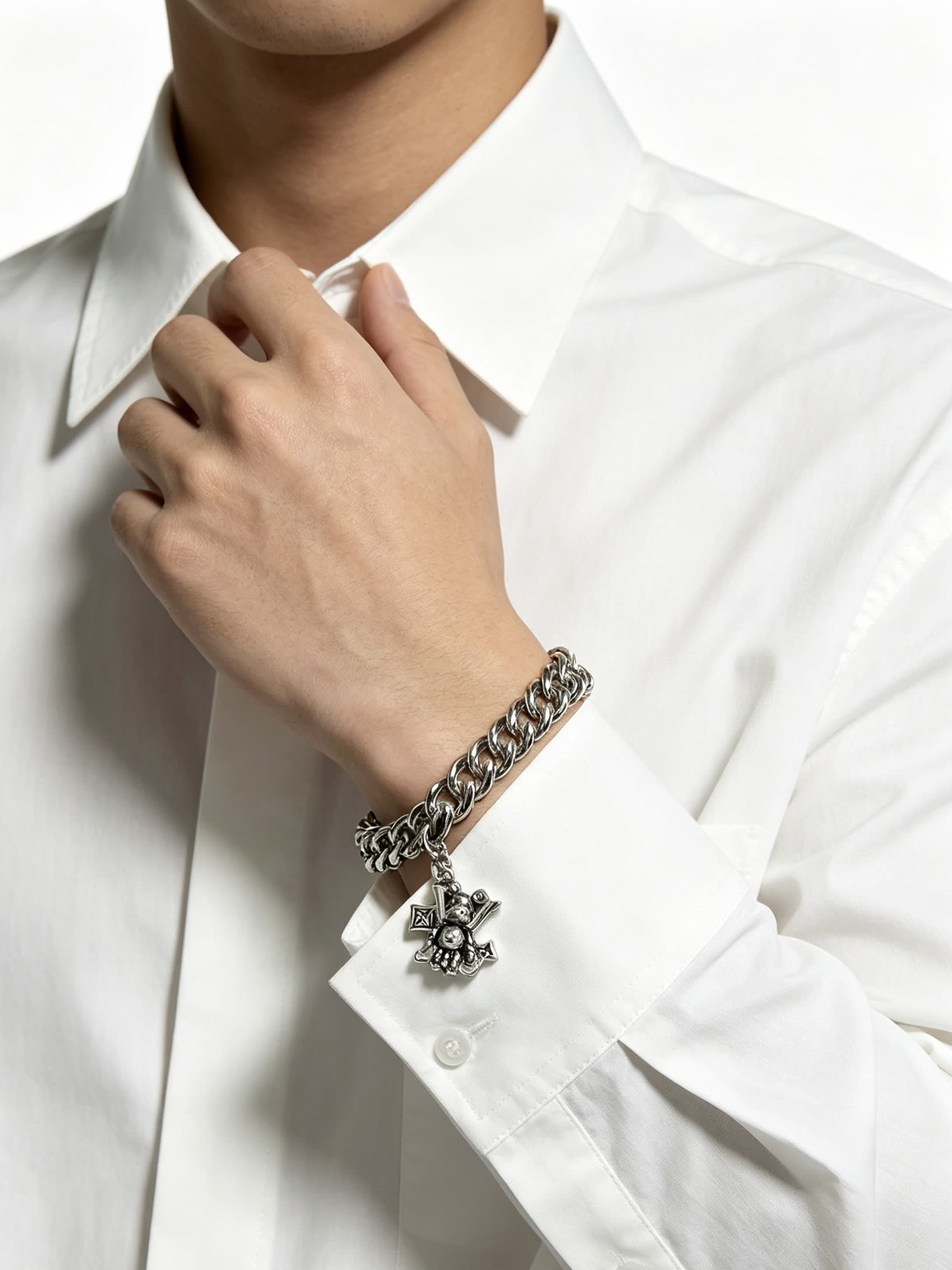 Louis Vuitton Silver Tone Bracelet with Monogram Charm